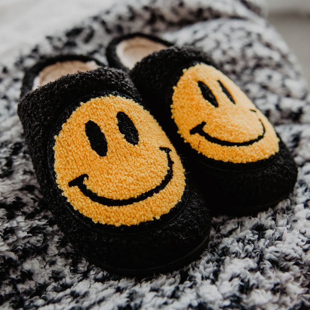 Plush smiley face slippers