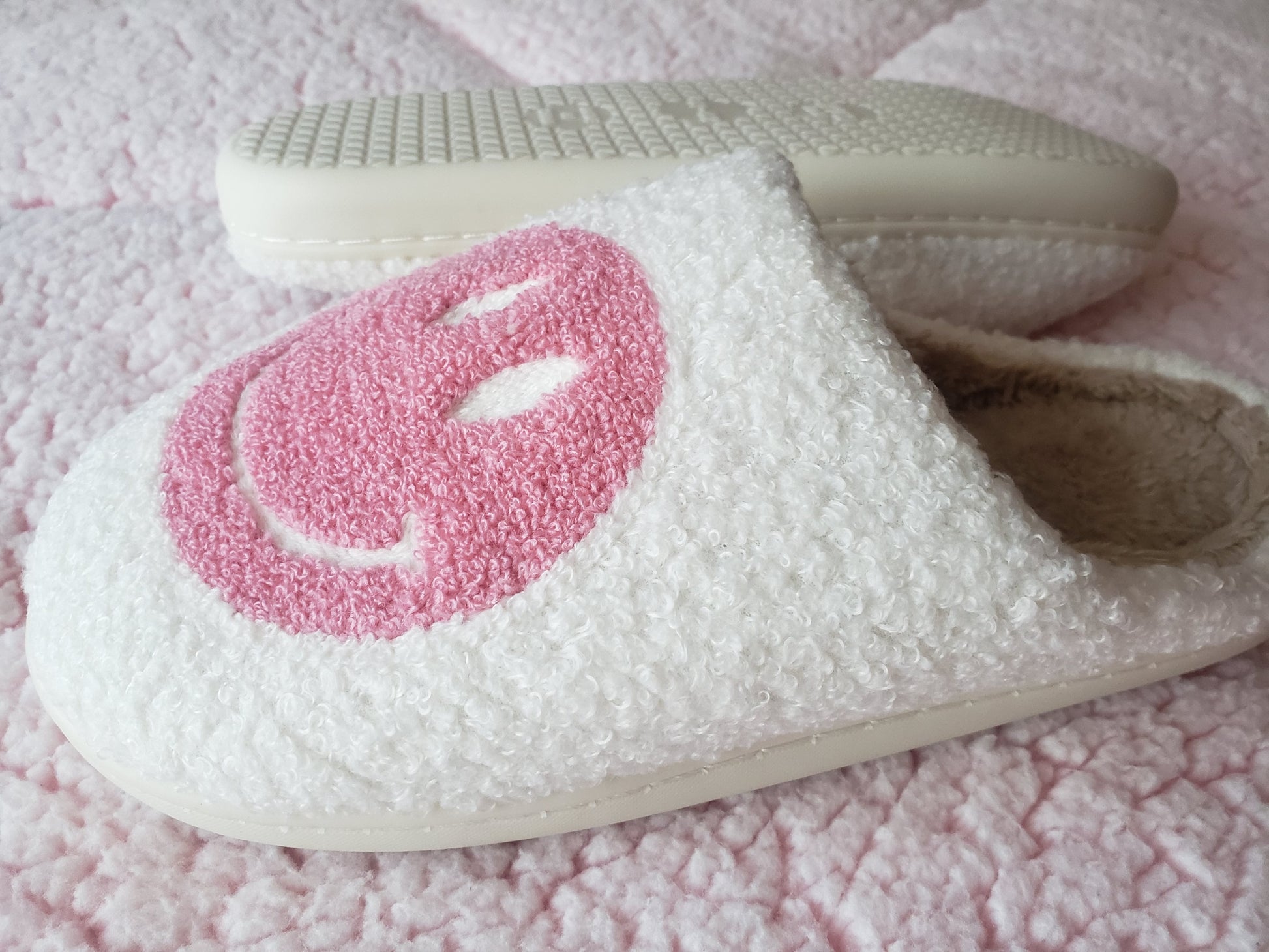 Plush smiley face slippers
